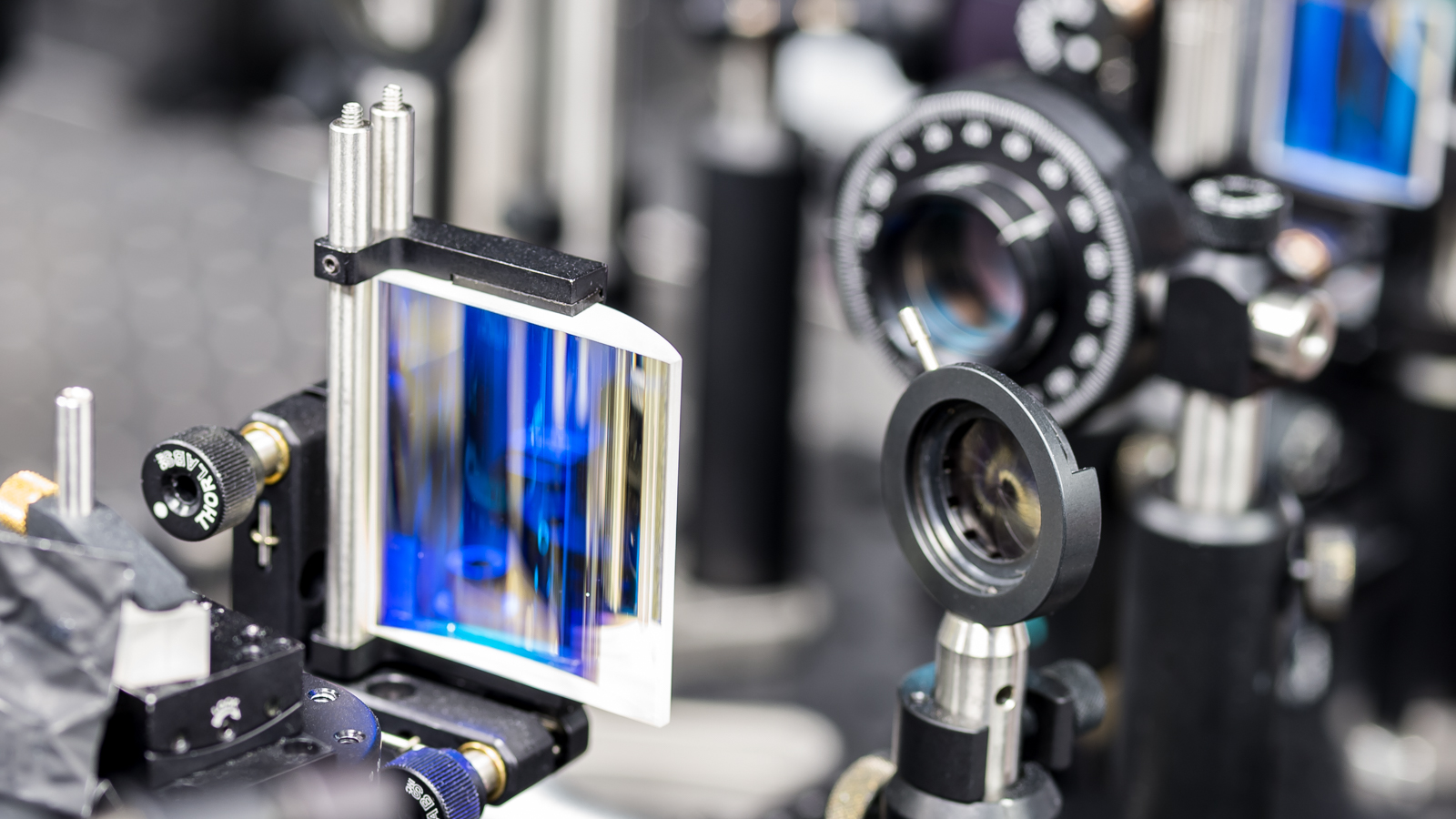 Closeup of lenses with blue highlights.